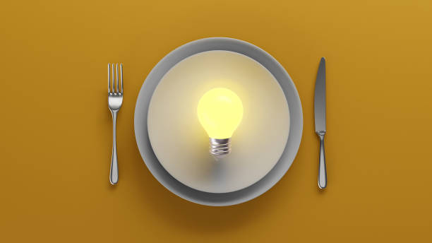 Top view of light bulb on white ceramic plate set, 3D render