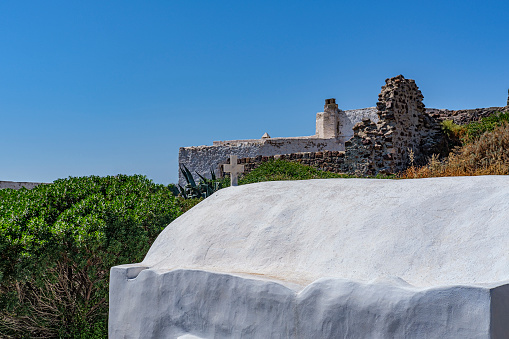 amazing view of Greek churches on Milos island, whitewashed architecture, traditional orthodox culture, landscape, top on hill