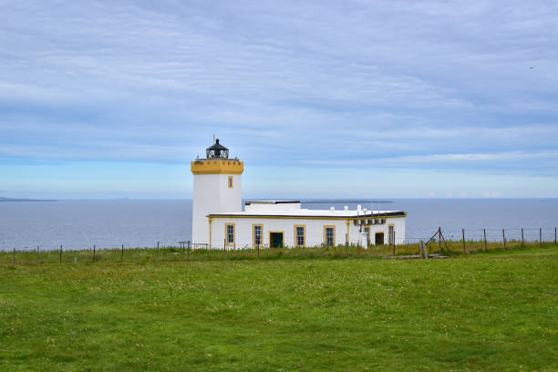 istock Duncansby Head Lighthouse, Scotland, United Kingdom 1980587245