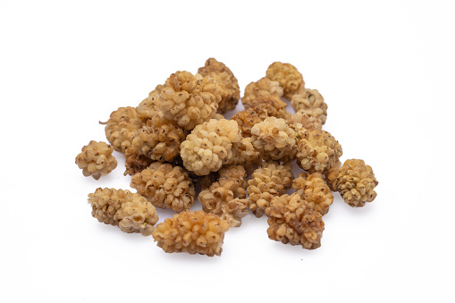 Dried white mulberry on white background