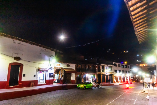 Valle de Bravo, State of Mexico, Mexico January 25 2024 cobbled streets with white houses, at night in the magical town of Valle de Bravo in the state of Mexico