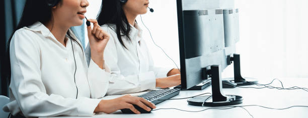 istock Call center wearing headset working in office for customer support oratory 1980700430
