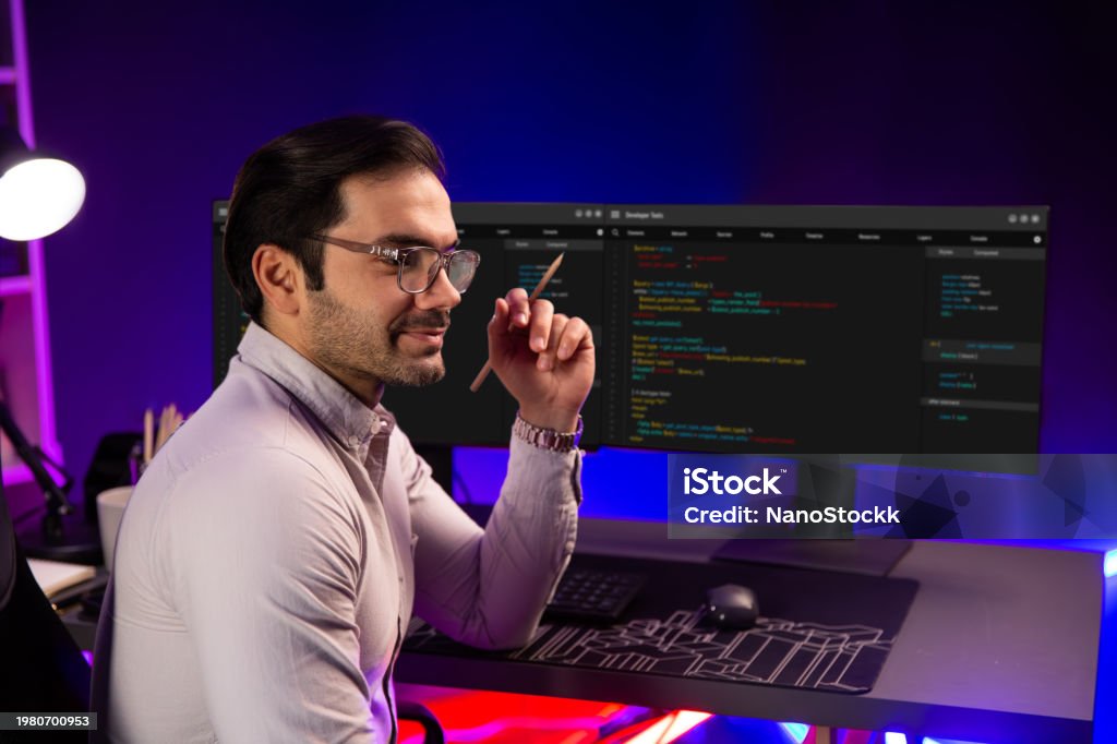 Stock Software Developer Smart It Developer Holding Pencil With Software Development Coding ...
