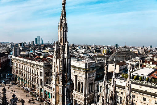Mighty Towers Of Duomo Overlooking Gallerie Vittorio Emanuele II In Milan, Italy