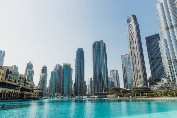Low angle view of center district of Dubai city in United Arab Emirates with skyscrapers and old architecture buildings