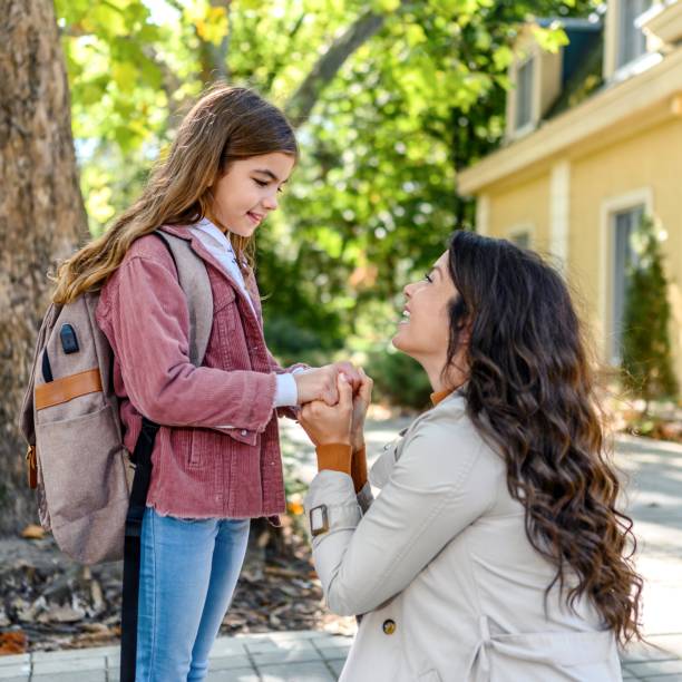 istock Mother taking her daughter to school 1980773577