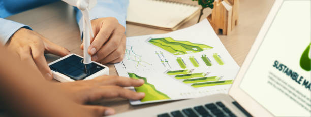 istock Graph shows the result of using renewable energy increase profits. Delineation. 1980780321
