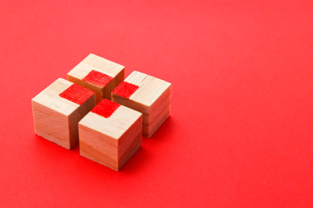 Wooden cube puzzle forming a square in its center