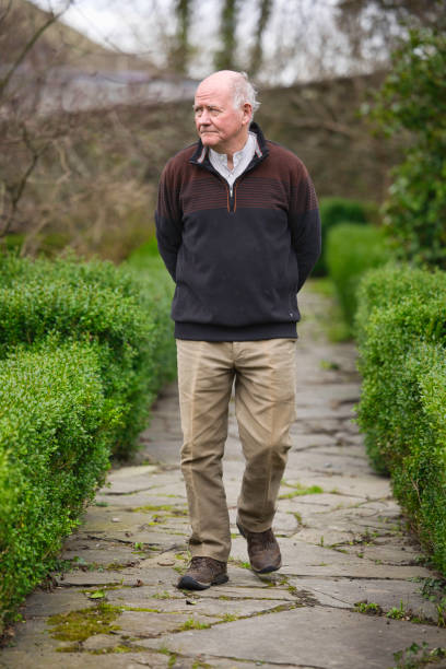 istock Elderly man in his gardening clothes 1980842534