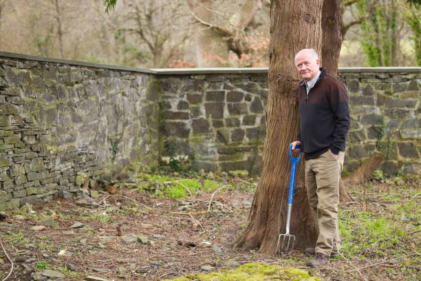 istock Elderly man in his gardening clothes 1980844074