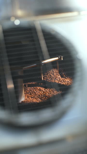 Roasting coffee machine in motion