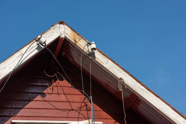 During the construction of a new house, a framing beam is being installed an aerial view