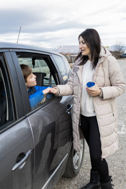 istock Mother and son are enjoying a car ride. 1980873149
