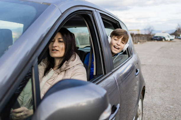 istock Mother and son are enjoying a car ride. 1980880959