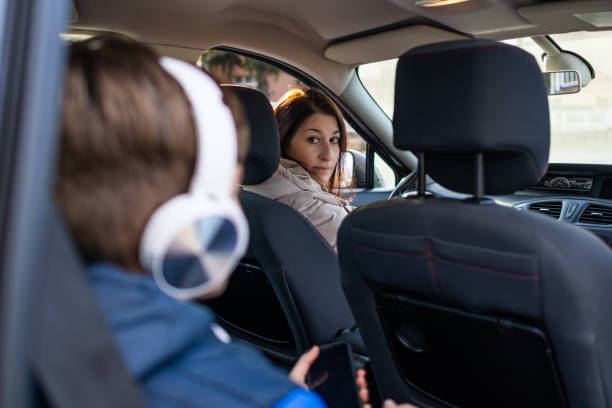 istock Mother and son are enjoying a car ride. 1980901890