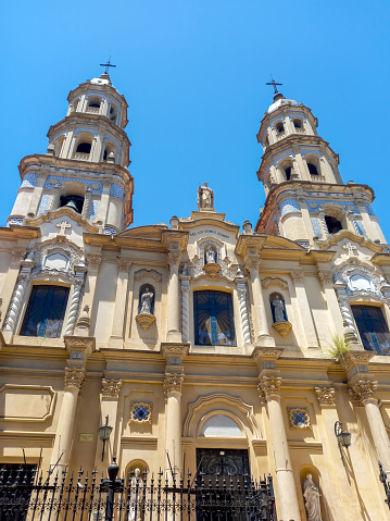 Buenos Aires, Argentina - Jan 14, 2024: Low angle shot of the facade of the ancient Saint Peter Telmo Church in Buenos Aires, Argentina.