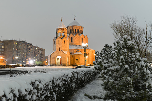 The Night scene with a snowy church