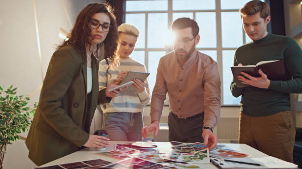 istock Team coworkers brainstorming office conference room. Colleagues discussing work 1980963156