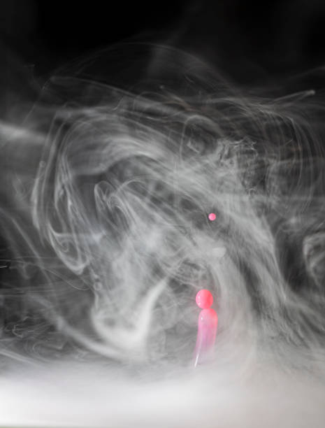 Droplet photography, high speed macro photography with water droplets creating stunning figures i black enviroment and fog
