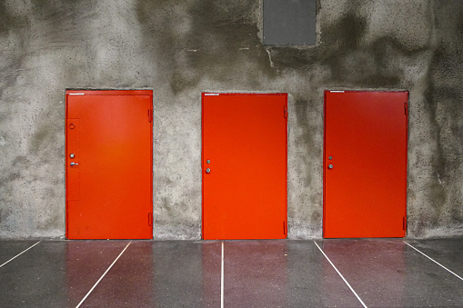 View of three red doors