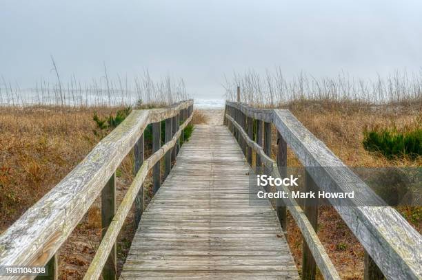 Kure Beach Misty Ocean Boardwalk Stock Photo - Download Image Now - Beach, North Carolina - US State, Coastline