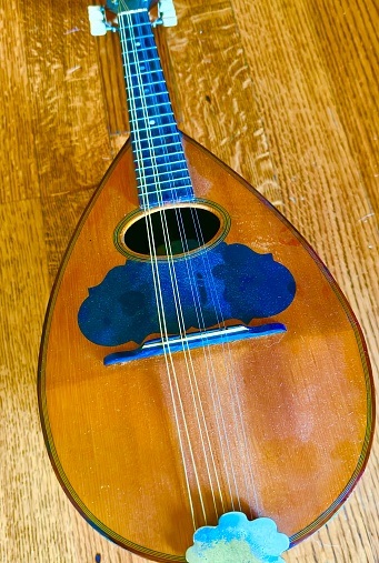 A generic acoustic guitar on white background