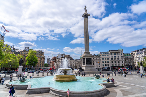 London England - May 29 2023: People Standing and Walking Around Trafalgar Square in London England