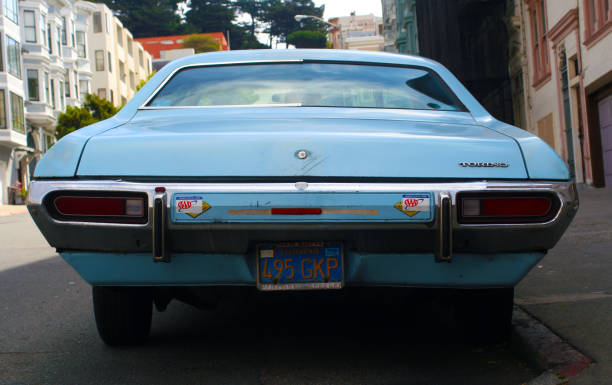 Sky blue Ford Torino motor car on street in San Francisco, USA San Francisco, CA, USA 08/20/2008 Photo of a classic seventies light sky blue Ford Torino motor car rear view parked on on street in San Francisco, California, USA neighborhood crime watch stock pictures, royalty-free photos & images