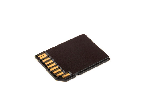 SD memory card. A card with metal contacts. The concept of memory cards for different equipment