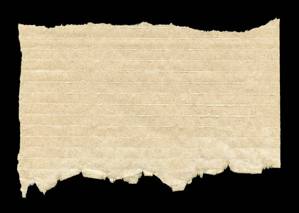 Cut or torn paper background textured isolated on black.