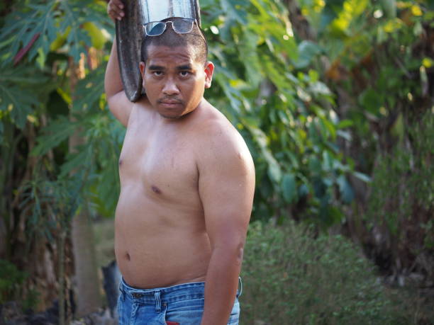 man carry steel wheel