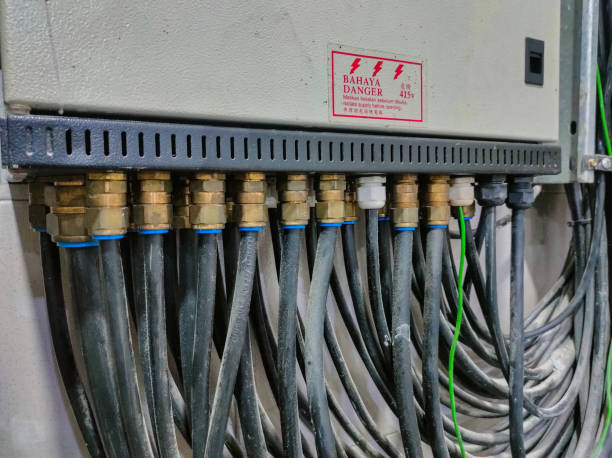 istock Several types of cables that have been completed are inserted into the main switch box in a laboratory 1981490681