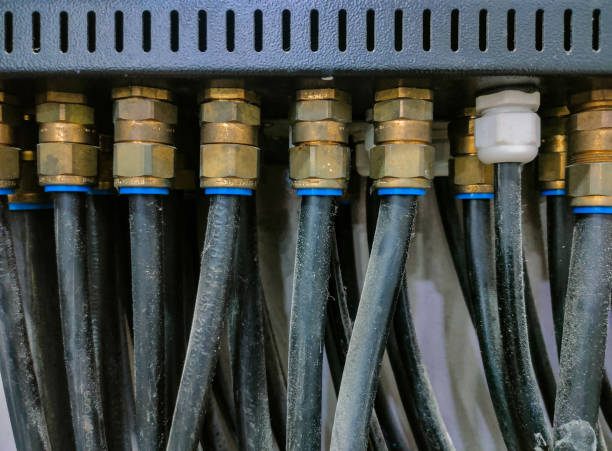 istock Closeup of several types of cables that have been put into the main switch box in a laboratory 1981493483