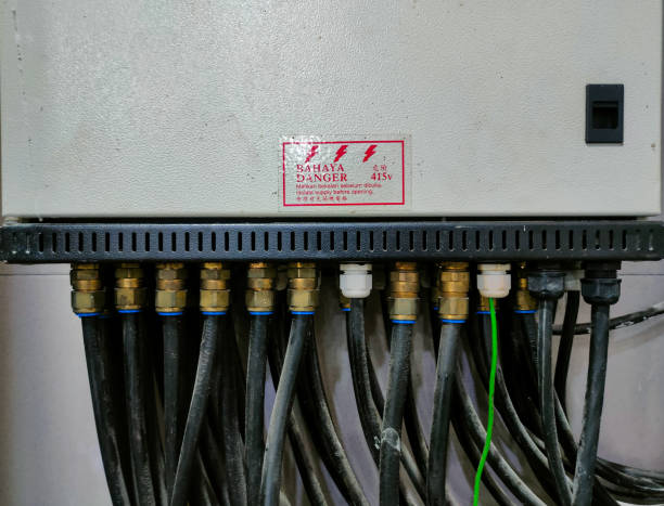 istock Neat and organized several types of cables that have been ready to be inserted into the main switch box in a laboratory 1981493485