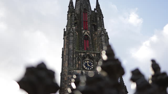View of Tolbooth Kirk Church in Edinburgh, Royal Mile in Edinburgh, The Hub high spire church in Edinburgh city centre, Gothic Revival architecture in Scotland