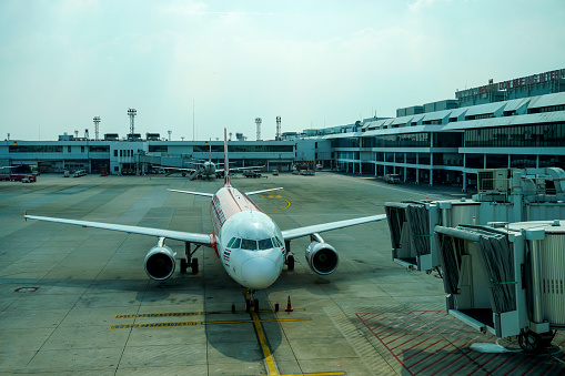 Bangkok, Thailand -December 10, 2023 : Don Mueang Airport in Bangkok, departure area, aircraft delivery