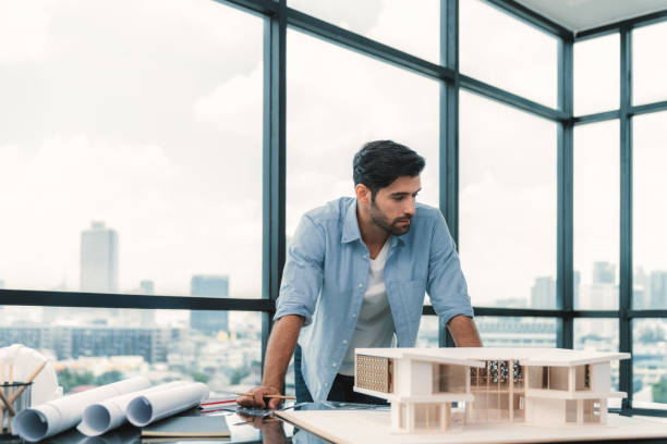 istock Smart civil engineer looking while planing design house construction. Tracery. 1981693541