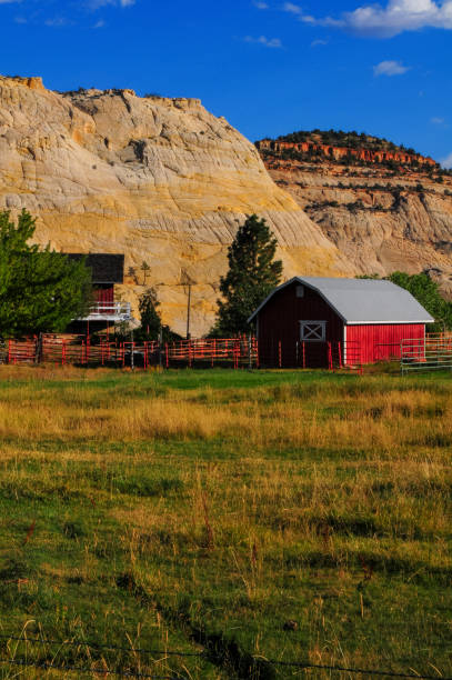 A farm and the white slickrock domes at the beginning of the Burr Trail, Boulder, Utah, Southwest USA.