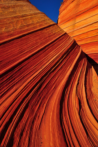 Early morning light on The Wave sandstone formation, Coyote Buttes North, Vermilion Cliffs National Monument, Arizona, USA.