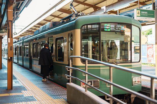Enoshima Dentetsu train Line in Kamakura, Japanese railway connects Kamakura in Kamakura with Fujisawa Station in Fujisawa, Kanagawa. Landmark attraction near Tokyo. Kanagawa, Japan, 16 November 2023