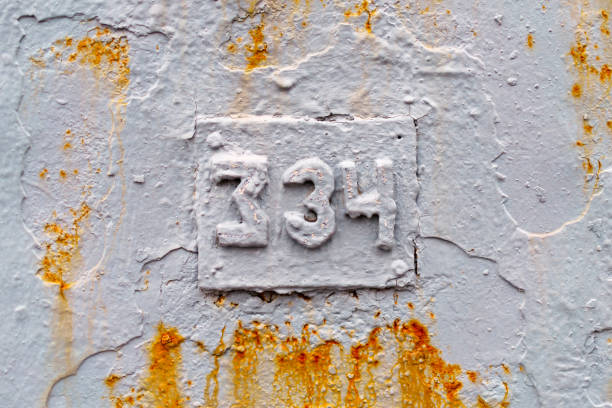 istock Number 334 made of grey metal elements with traces of rust 1981924632