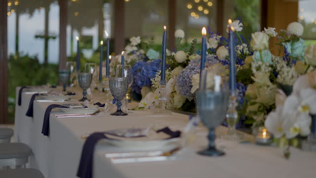 Wedding decor bouquet candle dinner table.
