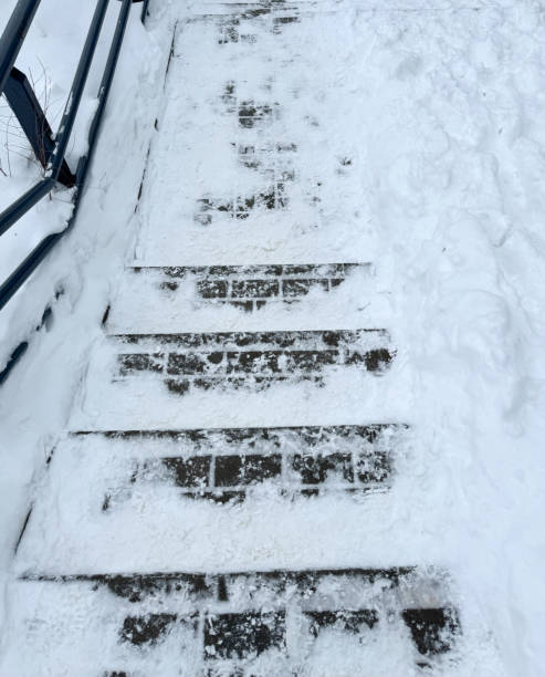 istock Steps on the stairs in the snow in winter 1981946100