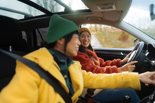 Photo of two Japanese friends on a road trip