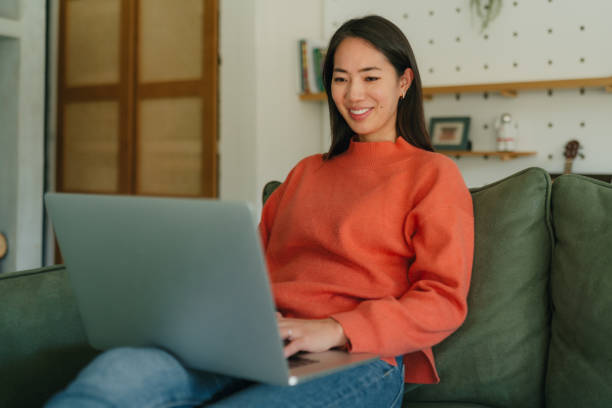 istock Japanese woman using a laptop 1981969089