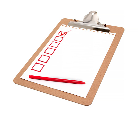 Checklist on clipboard isolated on white background.
