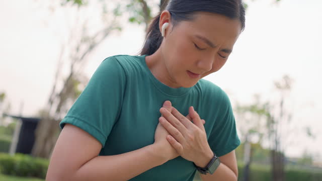 Asian woman was sick with chest pain while exercising at public park.