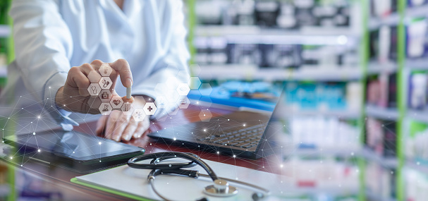 Doctor shows pill for outpatient treatment of patient.