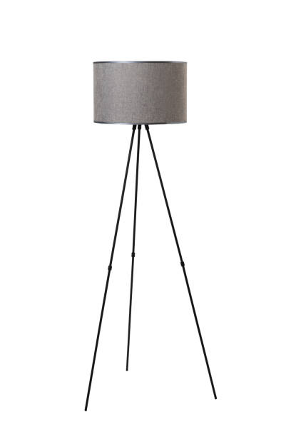 istock A three-legged floor lamp with a textile shade is isolated on a white background 1982077194