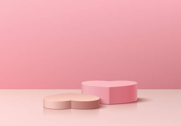 istock Realistic 3D pink, white podium pedestal set in heart shape with pink background. Valentine pastel minimal wall scene mockup products showcase, Promotion display. Vector abstract  3D geometric forms. 1982089249